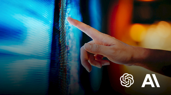 hand touching a glowing blue screen beside the OpenAI and Anthropic logo.